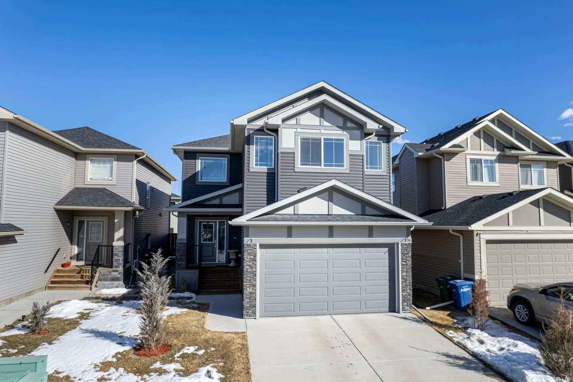 Newer front-drive houses in Bayview Airdrie
