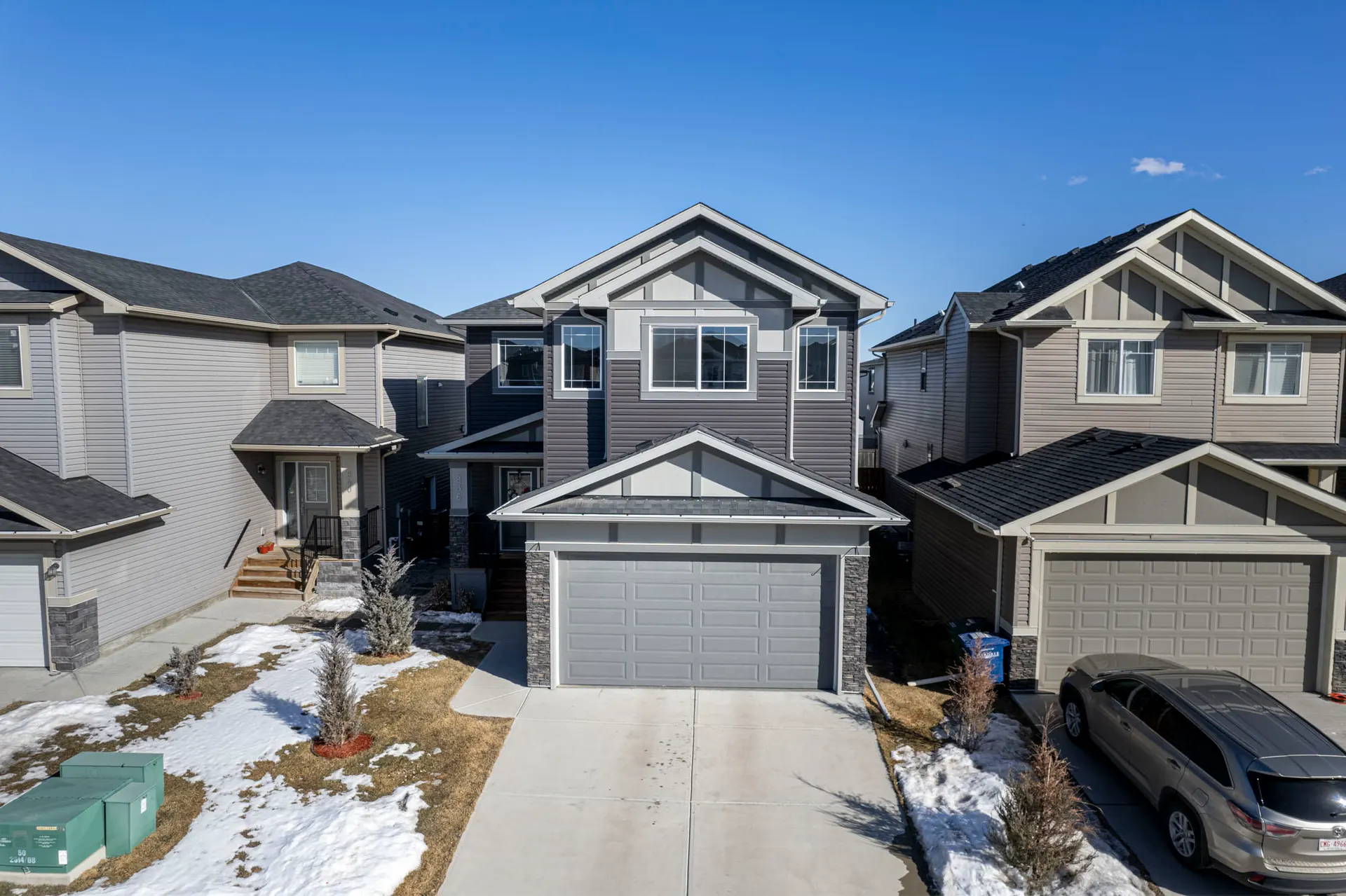 Detached homes on a residential street in Bayview Airdrie