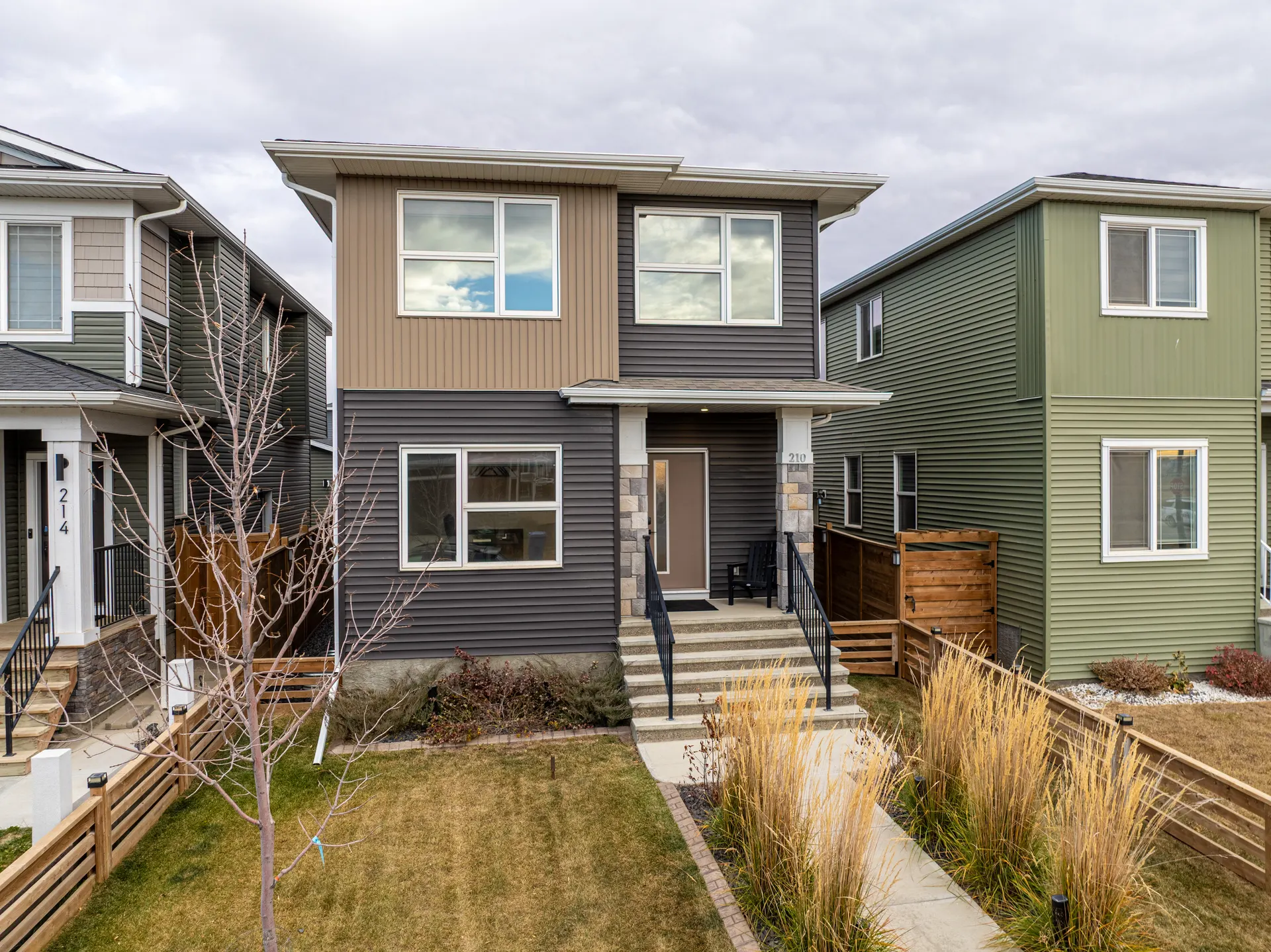 Laned homes with front porches in Chelsea Chestermere