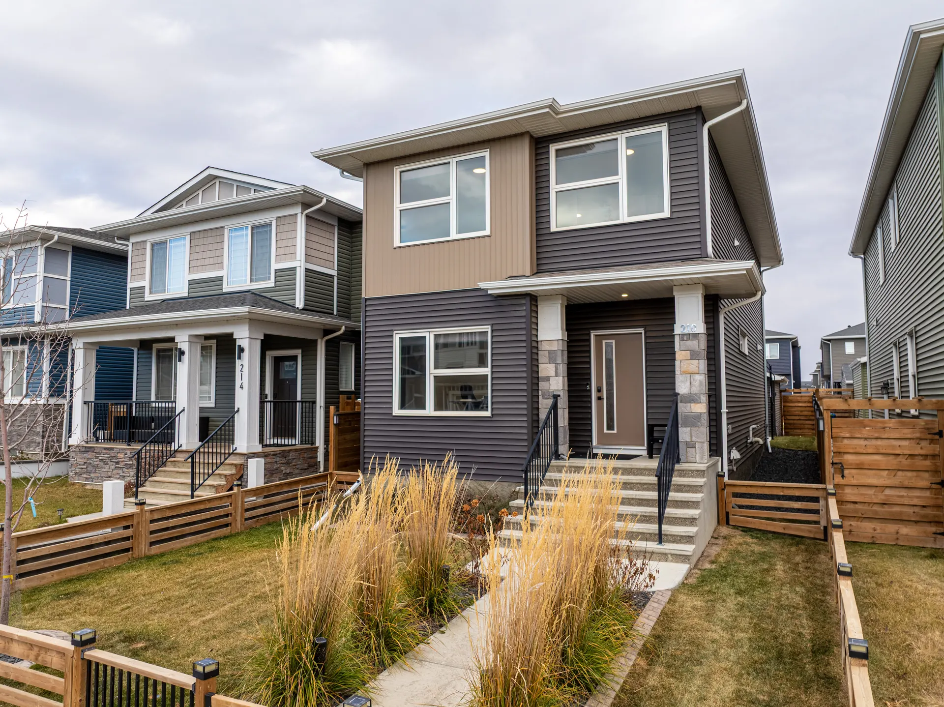 Newer detached homes along a street in Chelsea Chestermere