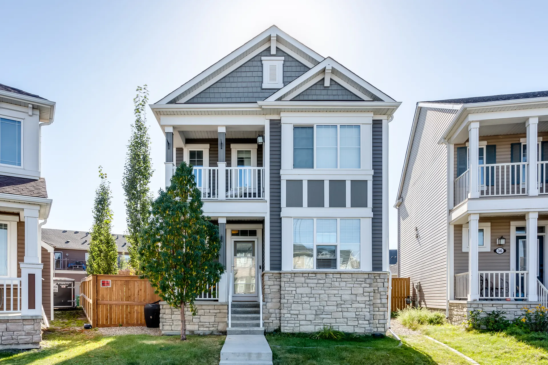 Front elevation of a three-storey townhome-style home in Cityscape, Calgary NE