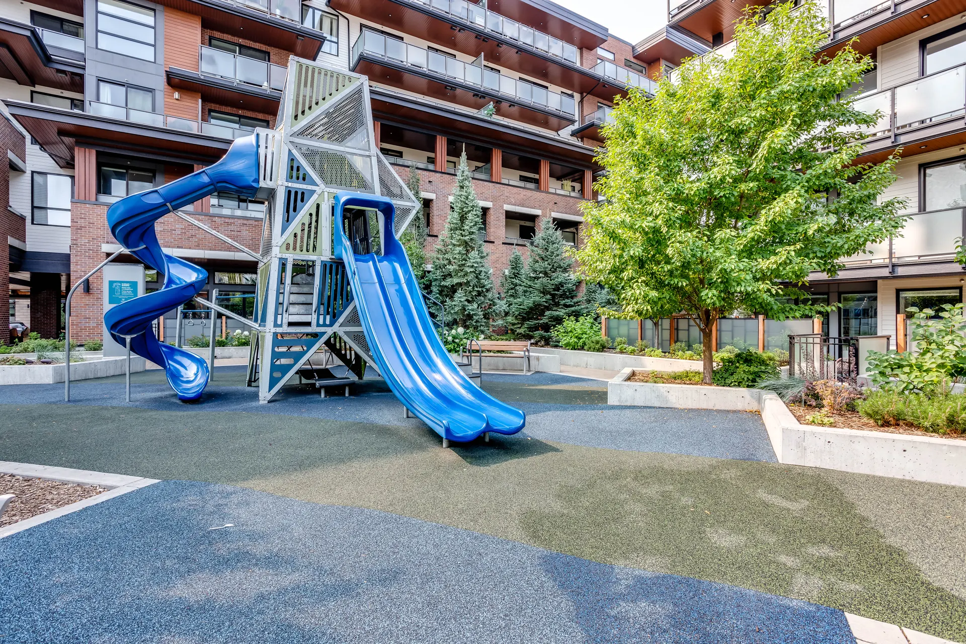 Children’s playground inside a residential courtyard in Mahogany